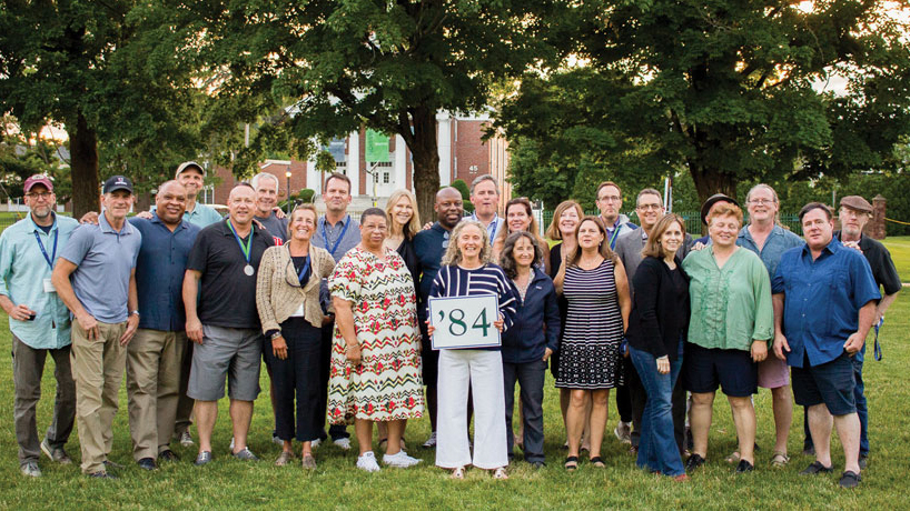 people posing on lawn