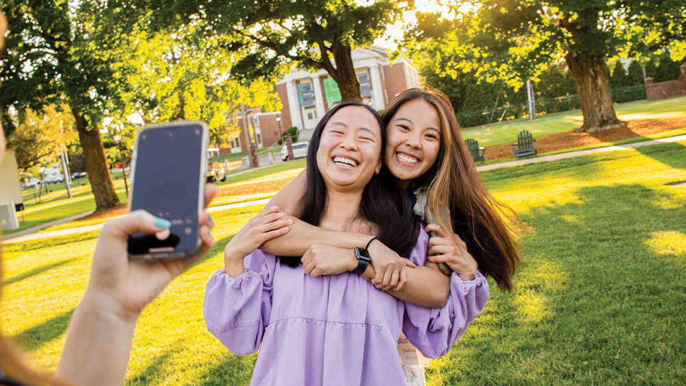 people posing on lawn