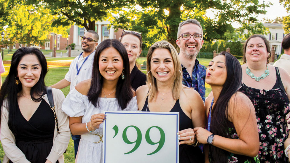 people posing on lawn