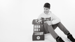 student with box project