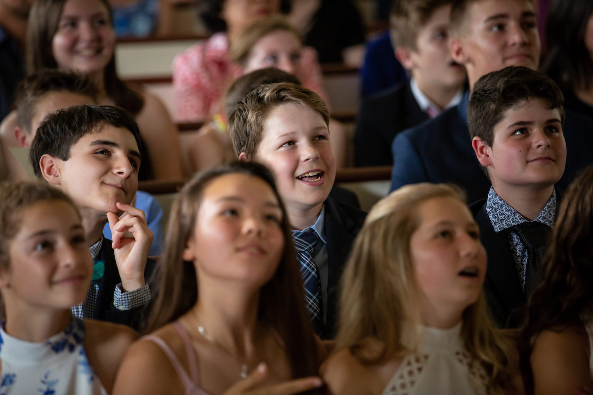 students dressed up in a chapel