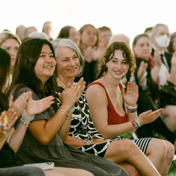 people clapping at event