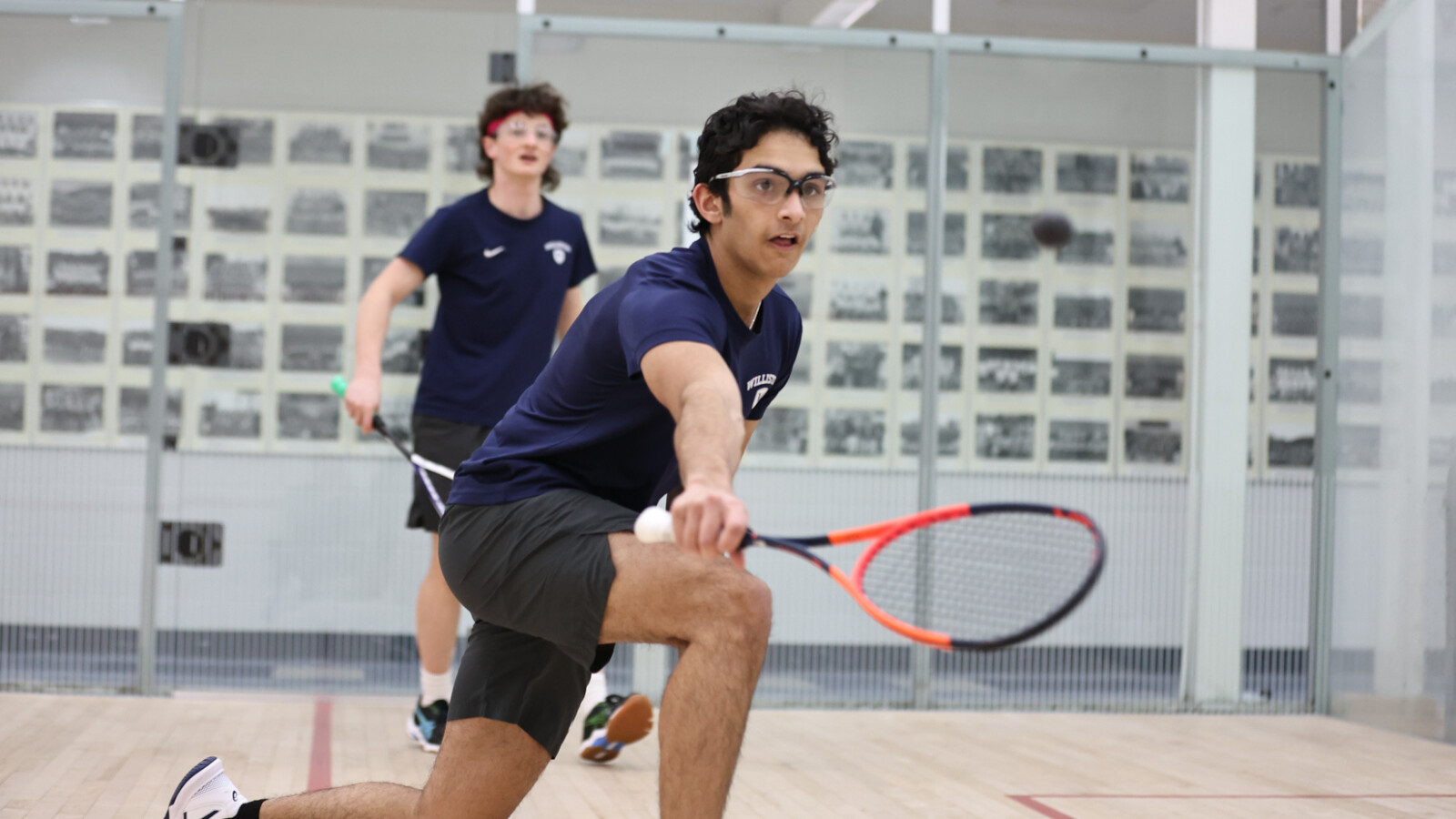 boys playing squash