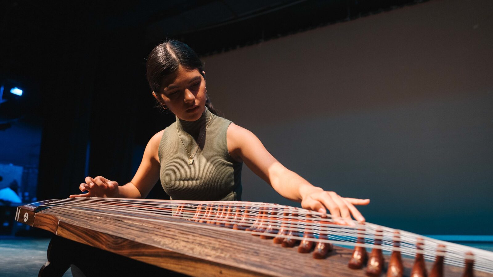 student playing instrument