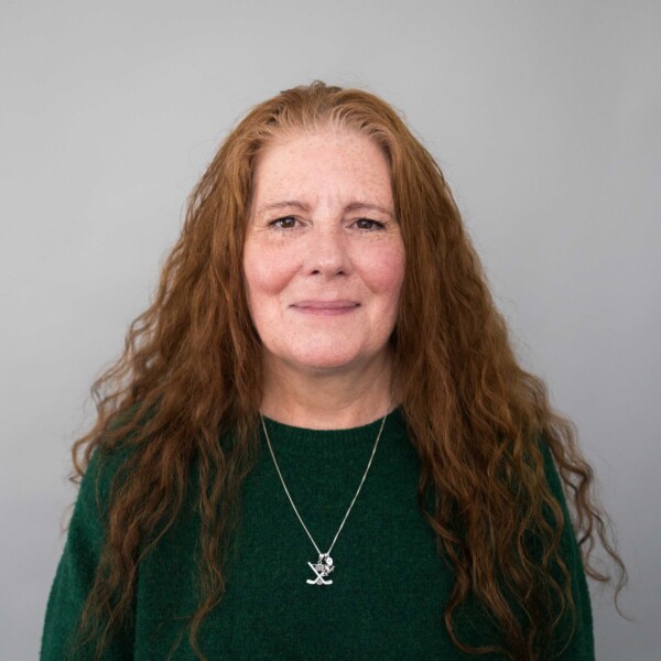 woman in green sweater
