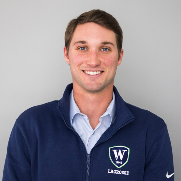 man wearing lacrosse shirt