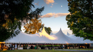large white tent under moon